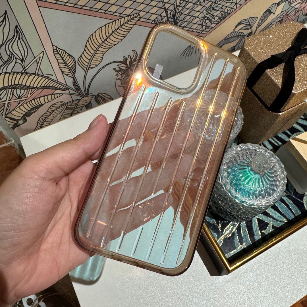 RIMOWA Clear Casing iPhone 13 Pro Max (Category: Cases & Sleeves) located in San Juan City. Submitted by coveted87 (Listing ID 1384363911, Image 2). Description: -comes with box -bpi/gcash -lala/j&t from san juan -guaranteed authentic -iphone 13 pro max -with discoloration on edges -retails for around P8k.