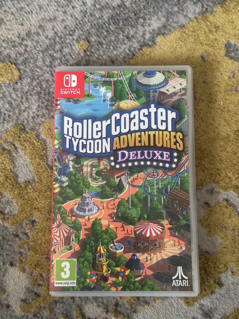 ROLLER COASTER TYCOON ADVENTURE DELUXE Video Gaming Video Games