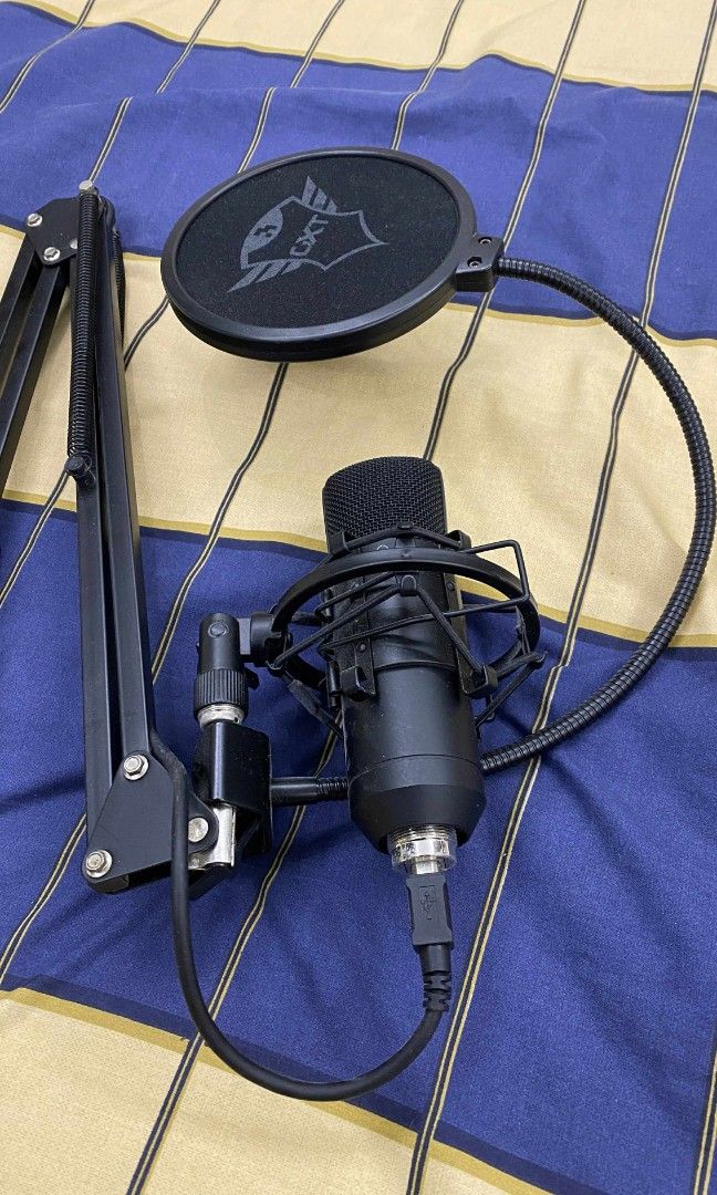 USB Microphone (Category: Microphones) located in Paranaque City. Submitted by closetcleanser_ (Listing ID 1384383697, Image 2). Description: Trust USB Microphone with Adjustable Arm and Pop Filter (Used - Excellent Condition) Selling my Trust USB microphone setup. It’s a desk-mounted mic with an adjustable arm and pop filter included. Everything is in excellent working condition and delivers great sound quality—clear, crisp, and professional. Pe