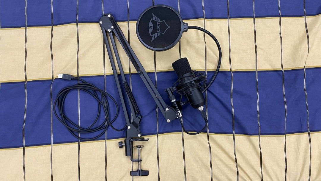 USB Microphone (Category: Microphones) located in Paranaque City. Submitted by closetcleanser_ (Listing ID 1384383697, Image 1). Description: Trust USB Microphone with Adjustable Arm and Pop Filter (Used - Excellent Condition) Selling my Trust USB microphone setup. It’s a desk-mounted mic with an adjustable arm and pop filter included. Everything is in excellent working condition and delivers great sound quality—clear, crisp, and professional. Pe