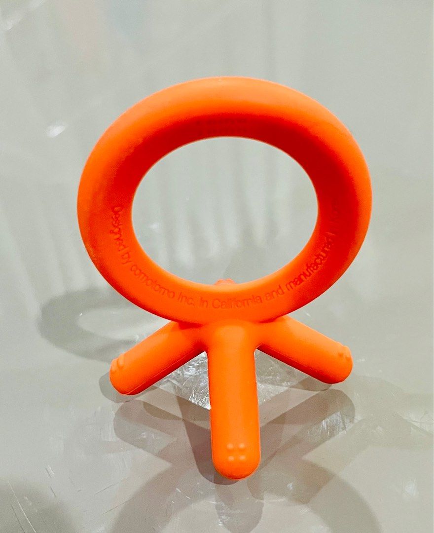 Comotomo Baby Silicone Teethers (Set of 2) (Category: Soothers & Pacifiers) located in Manila. Submitted by prelovedbycristinemargaux (Listing ID 1387922676, Image 2). Description: Selling both orange and blue as a set Lightly Used; No signs of usage DESCRIPTION: Comotomo Silicone teethers are designed to mimic those little baby fingers and are made with hygienic silicone material that’s safe and oh so perfectly chewy. The teethers are designed t
