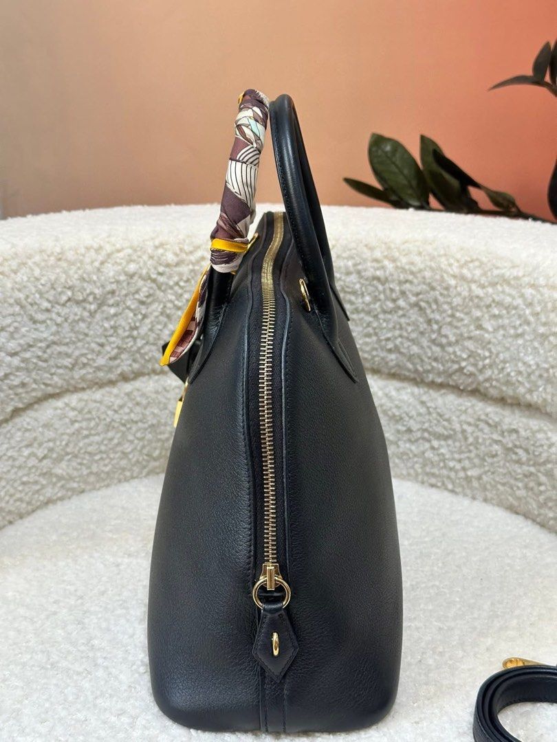 Authentic Hermes (Category: Luxury Bags & Wallets) located in Manila. Submitted by chloe_luxuries (Listing ID 1387890149, Image 2). Description: Guaranteed Original Hermes Bollide 30 in Gold hardware color Black Still in very good condition Comes with dustbag strap lock and keys Pm for those interested .