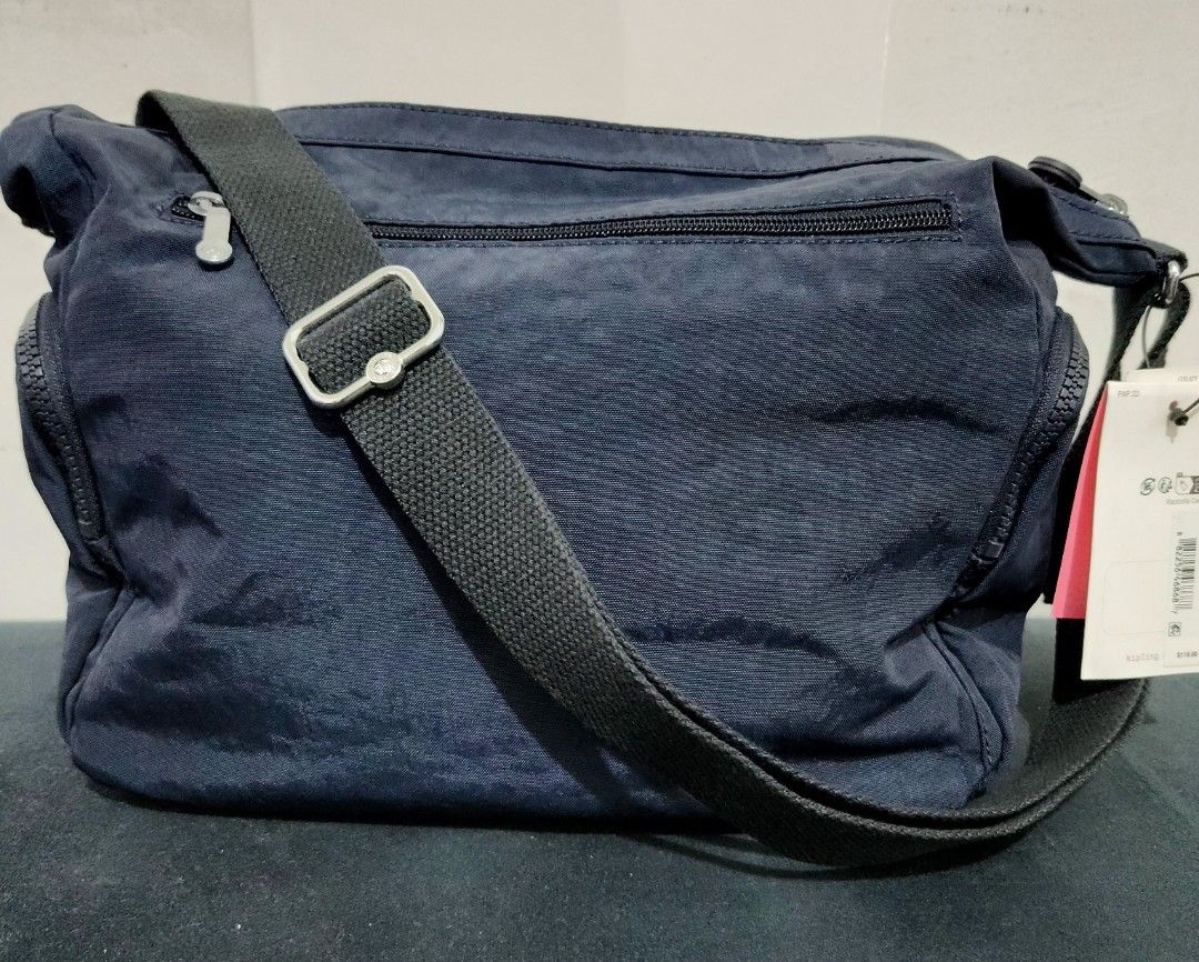 Original Kipling Gabbie Medium Crossbody Bag Blue (brand new) (Category: Shoulder Bags) located in Quezon City. Submitted by ki_cai (Listing ID 1387770526, Image 2). Description: -Color: Blue -Material: Classic Water resistant Kipling Nylon -Strap: Adjustable shoulder/crossbody strap -Inclusions: comes with the iconic monkey keychain/charm attached - No flaws, no stains or issues. Zippers are 100% smooth - has multiple zip pockets - designed with