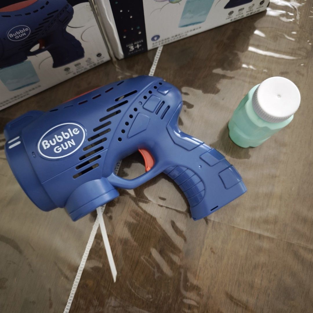 Bubble Gun (Category: Kids Toys) located in Manila. Submitted by siopao0130 (Listing ID 1387784409, Image 1). Description: Bubble Gun - brandnew - bought for Php194 - bubble concentrate included in package - needs AA batteries (not included) - color blue only - last price, low ballers keep out! Wag na tumawad!.