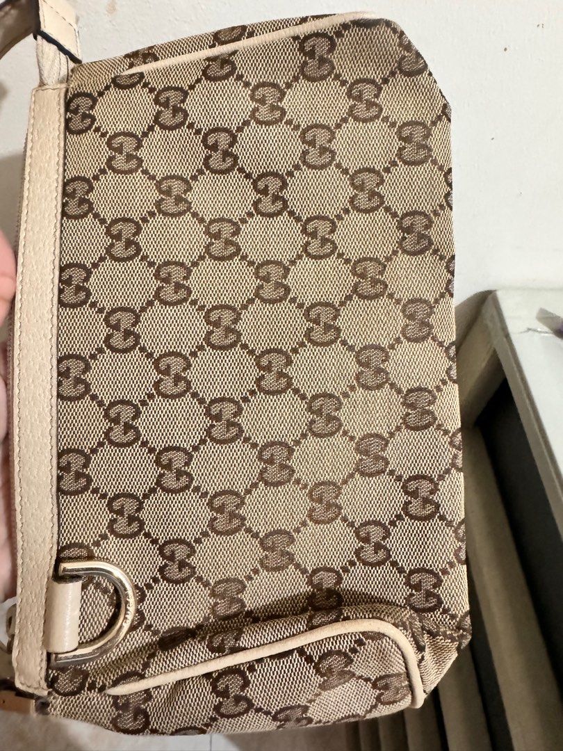 Gucci GG mini pochette (Category: Luxury Bags & Wallets) located in Rizal. Submitted by bettersellthatstuff (Listing ID 1387932371, Image 2). Description: Second hand With sign of usage Bought in Japan Needs cleaning Pass sa sobrang tumawad..