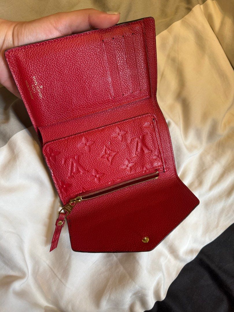 LV Empreinte Red Trifold Wallet (Category: Luxury Bags & Wallets) located in Manila. Submitted by ganned (Listing ID 1387781185, Image 2). Description: LV Red Empreinte Wallet Well used but in great condition Authentic from my trip in Japan.
