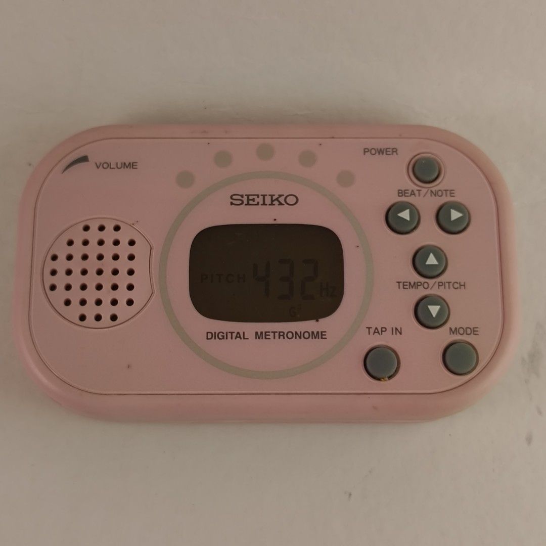 Seiko DM100 Pink Digital Metronome (Category: Musical Instruments) located in Taguig. Submitted by dandydane (Listing ID 1387841988, Image 1). Description: Digital Metronome 👍This is a multi-function digital metronome with a tap function. 👍It features a tempo range of 30 to 250 BPM and various beat patterns. 👍The tempo is visually indicated by five bright LEDs, making it suitable for various uses, including on-stage performances. 👍It includes