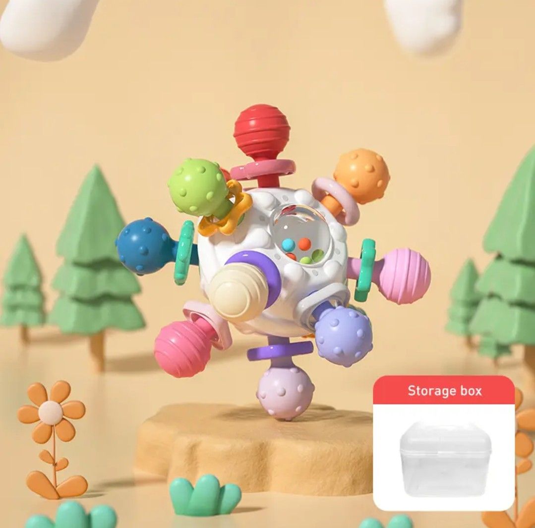 Smart Sprout Teether Toys Colorful Rattle Ball Handle (Category: Soothers & Pacifiers) located in Bangui. Submitted by theelleacollective (Listing ID 1387816232, Image 1). Description: with storage box.