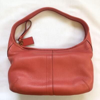 Vintage Coach (Category: Luxury Bags & Wallets) located in Quezon City. Submitted by martin.0308 (Listing ID 1387816056, Image 1). Description: Vintage Coach Ergo Pebbled Leather Shoulder Bag Rose Color negotiable.