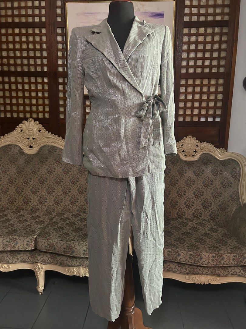 Vintage silver matching suit and pants (Category: Sets or Coordinates) located in Batangas. Submitted by mkjgb (Listing ID 1387792190, Image 1). Description: It is overlapping on the front and is tied by a ribbon. This was given by my mom. She bought it in Rustan’s about 30 years ago. The tags went off already. Still very clean inside with lining on both top and pants. Waist is 30”. This is high waisted. office dress, corporate attire, work cloth