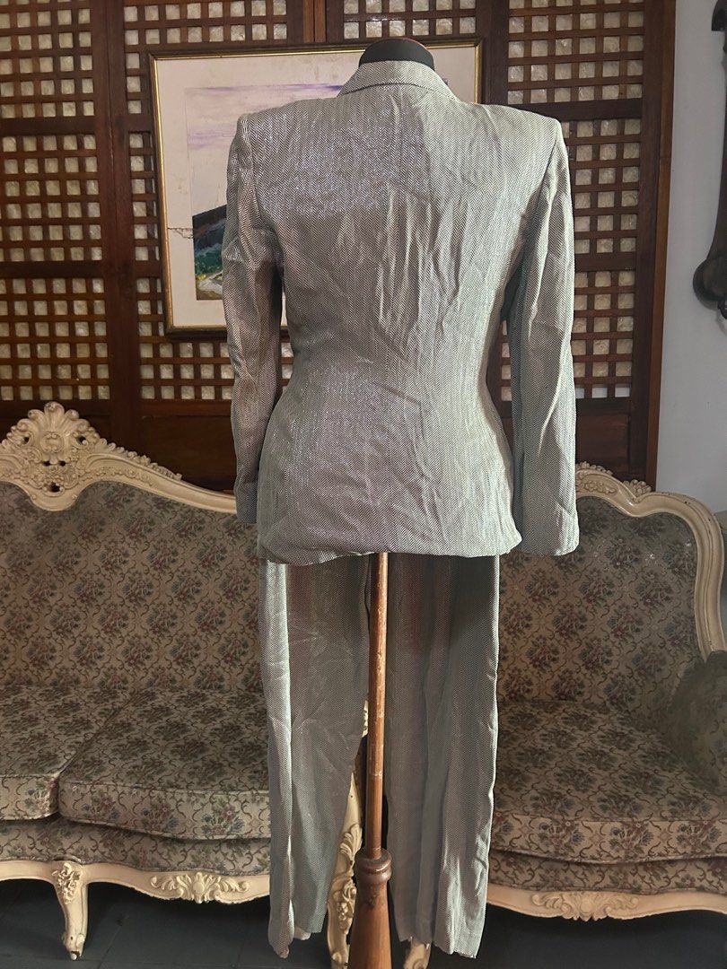 Vintage silver matching suit and pants (Category: Sets or Coordinates) located in Batangas. Submitted by mkjgb (Listing ID 1387792190, Image 2). Description: It is overlapping on the front and is tied by a ribbon. This was given by my mom. She bought it in Rustan’s about 30 years ago. The tags went off already. Still very clean inside with lining on both top and pants. Waist is 30”. This is high waisted. office dress, corporate attire, work cloth