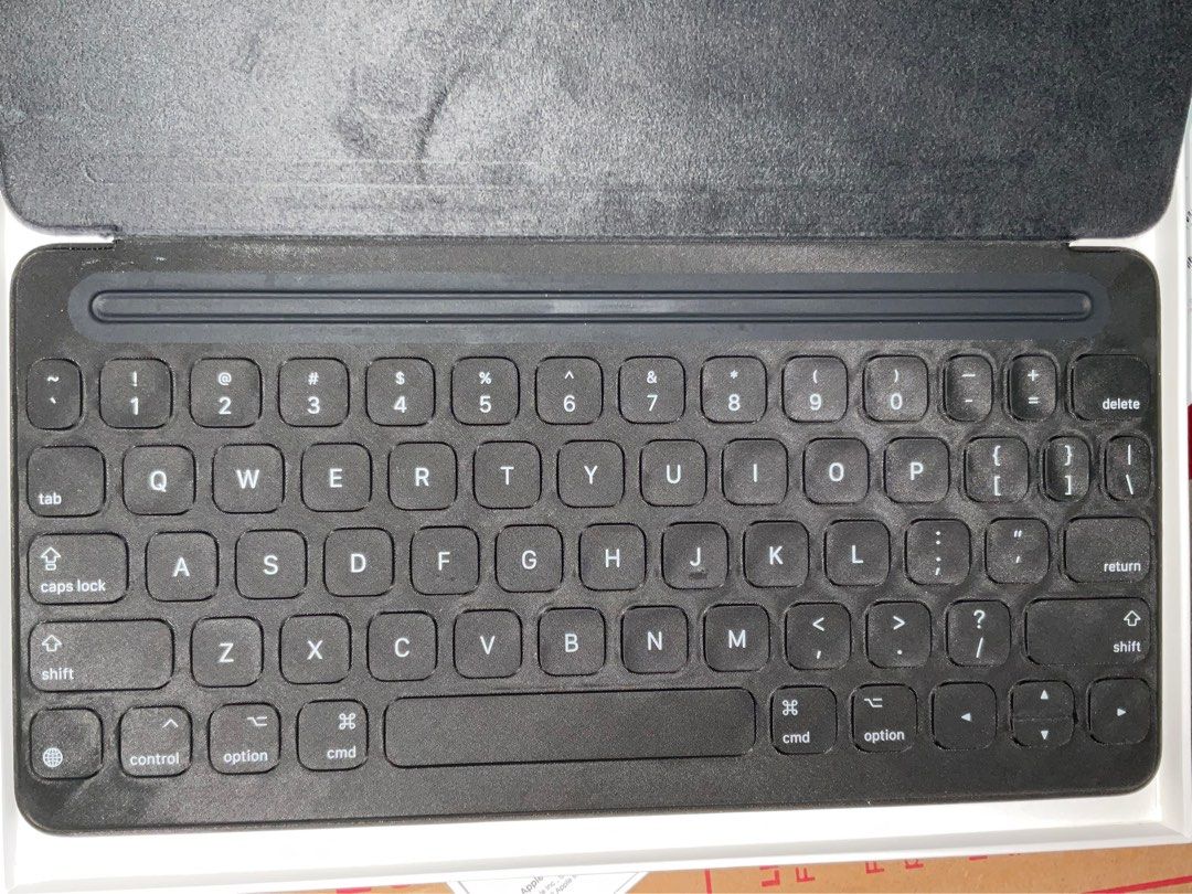 Apple Ipad Smart Keyboard (Unsealed w/honest issue) (Category: Other Mobile & Gadget Accessories) located in Manila. Submitted by 2025.gadgetspot (Listing ID 1388041317, Image 3). Description: authentic from apple US, this version is unsealed. -HONEST ISSUE: may dent siya you can see sa picture but overall 100% working. -cheaper than the sealed version but still the same product itself. - we’re not selling class A or premium copies. - out of stoc