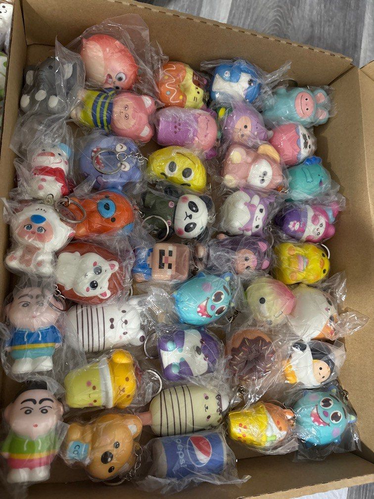 Assorted Squishy Keychains (Category: Character Goods) located in Singapore. Submitted by cosmicfish.8b5877 (Listing ID 1387548833, Image 7). Description: - Assorted squishy keychains - Individually packaged - Over 100 pieces available - Bulk purchase discounts - Images show some of the keychains.