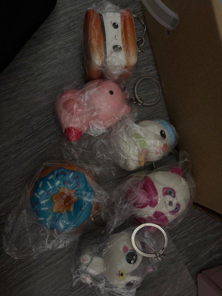 Assorted Squishy Keychains (Category: Character Goods) located in Singapore. Submitted by cosmicfish.8b5877 (Listing ID 1387548833, Image 6). Description: - Assorted squishy keychains - Individually packaged - Over 100 pieces available - Bulk purchase discounts - Images show some of the keychains.