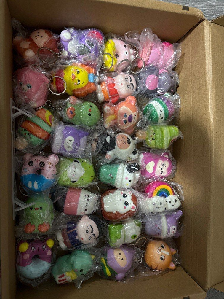 Assorted Squishy Keychains (Category: Character Goods) located in Singapore. Submitted by cosmicfish.8b5877 (Listing ID 1387548833, Image 5). Description: - Assorted squishy keychains - Individually packaged - Over 100 pieces available - Bulk purchase discounts - Images show some of the keychains.