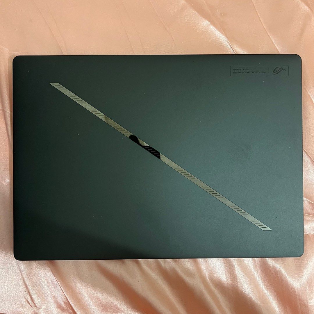 Asus ROG Zephyrus G14 (2024) GA403UI (Category: Laptops & Notebooks) located in San Fernando. Submitted by dee.tri (Listing ID 1388061791, Image 2). Description: !!!PLEASE FINISH READING!!! Bought for 164,999 PHP. Still in warranty for 2 years. Bought last April as a birthday gift to myself but I already finished building my PC rig. •Can provide more photos/videos upon request Inclusions: Original box with charger (there are 2 types, one as USB-C