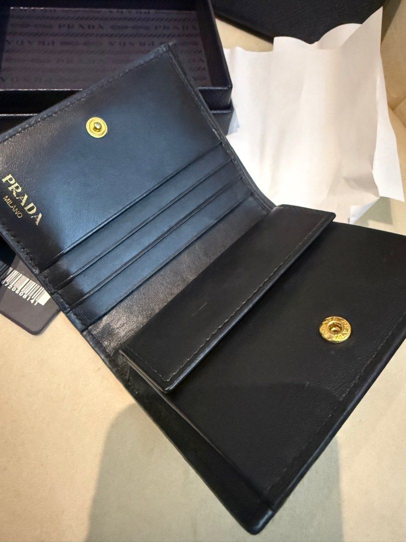 Authentic Prada wallet (Category: Luxury Bags & Wallets) located in Caloocan City. Submitted by maryjoe. (Listing ID 1388016820, Image 2). Description: Used prada wallet My flaws but still okay pa gamitin Bought for 30,000 RFS: currently using hermes DUO calvi.