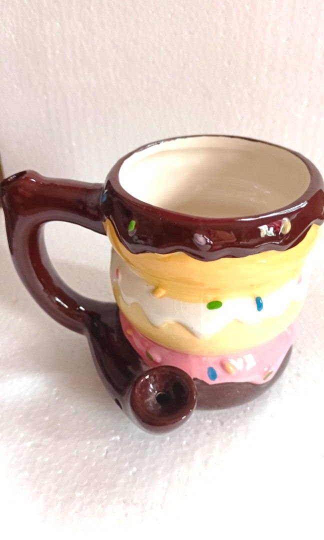 Ceramic Colored Donut Coffee Mug with Teaspoon Rest (Category: Coffee & Tea Tableware) located in Quezon City. Submitted by thequaintshop (Listing ID 1387962391, Image 3). Description: 5" x 5" inches.