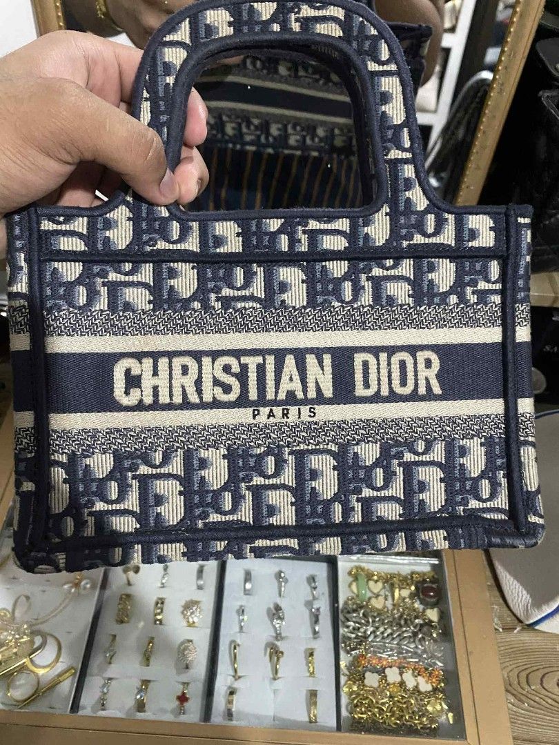 Christian Dior mini book tote (Category: Luxury Bags & Wallets) located in Bayombong. Submitted by kweeeen (Listing ID 1388094306, Image 2). Description: Christian Dior Blue Oblique Mini Book Tote Embroidered All signs of authenticity are present Coded.