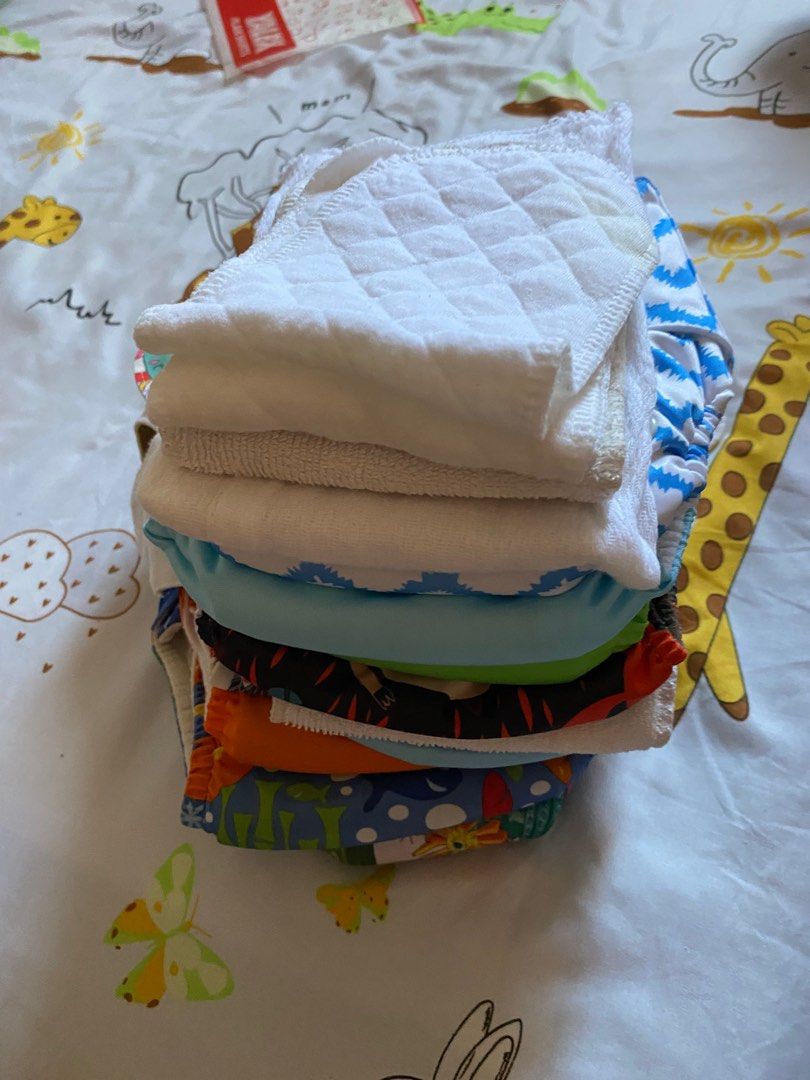 Cloth diapers (Category: Diapers & Baby Wipes) located in Rodriguez. Submitted by cyrus0207 (Listing ID 1388024483, Image 1). Description: Take all 10pcs cloth diapers with some inserts.