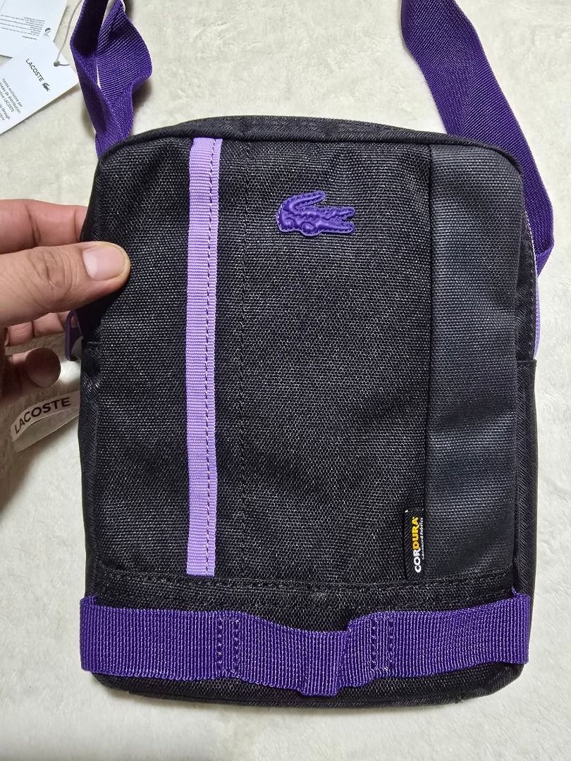 Lacoste Vertical Camera Sling Bag (Brandnew) (Category: Camera Bags & Carriers) located in Santa Rosa. Submitted by omnicronzxc (Listing ID 1387972451, Image 1). Description: ₱ NOW 3,000 each add shipping J&T PO (5,950 SRP see price tag) 📌 Lacoste Sling Bag 🐊 Size : Width: 7.2 Length: 8.5 Depth: 1.5 COLOR: Black Violet Condition: BRAND NEW rate : 10/10.