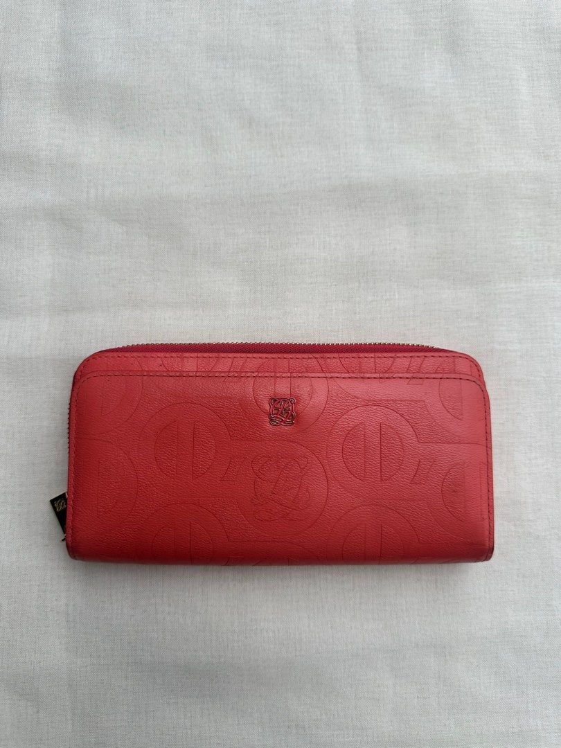 LOEWE Red Zip Around Leather Wallet (Category: Wallets & Card holders) located in Baguio. Submitted by stuffsbaguiooo (Listing ID 1388043715, Image 1). Description: can negotiate w this item! in very good condition pa, super nice! :) 100% authentic! :) .