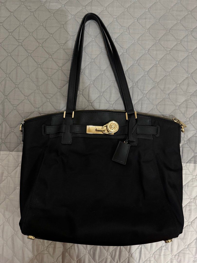Michael Kors Hamilton nylon satchel (Category: Luxury Bags & Wallets) located in Quezon City. Submitted by iamjenreeves (Listing ID 1388073201, Image 1). Description: Authentic Michael Kors Hamilton nylon satchel with sling. Excellent condition. Has several pockets. No inclusions. .