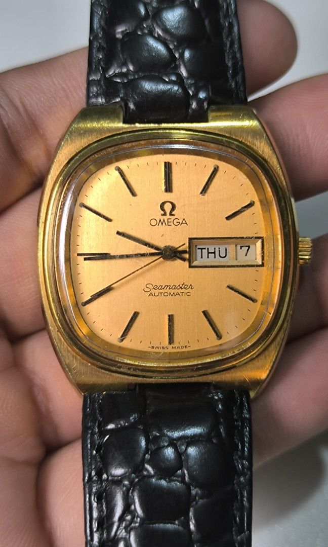 Omega Seamaster (Category: Men's Watches) located in Taguig. Submitted by j_watches007 (Listing ID 1292132458, Image 2). Description: Authentic Secondhand ⌚ Vintage Watch Omega Seamaster Automatic Gold Dial Day/Date Swiss Made L - 39.9MM W - 35.4MM Replacement Leather Strap Buckle ' Watch Only ' DISCLAIMER: IT'S OLD USED WATCHES EXPECT OF SOME SCRATCHES/SIGNS OF USAGE & PLEASE MANAGE YOUR EXPECTATIONS. THANKYOU..
