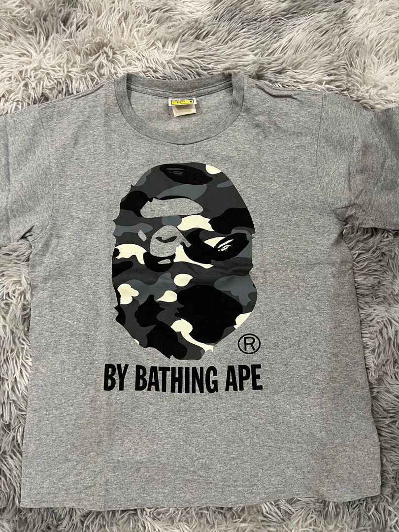 Original Bape (Bathing Ape) (Category: Tshirts & Polo Shirts ) located in Quezon City. Submitted by tangled8 (Listing ID 1387962562, Image 2). Description: Original Bape bought in Japan. Color gray measures 18"x22".