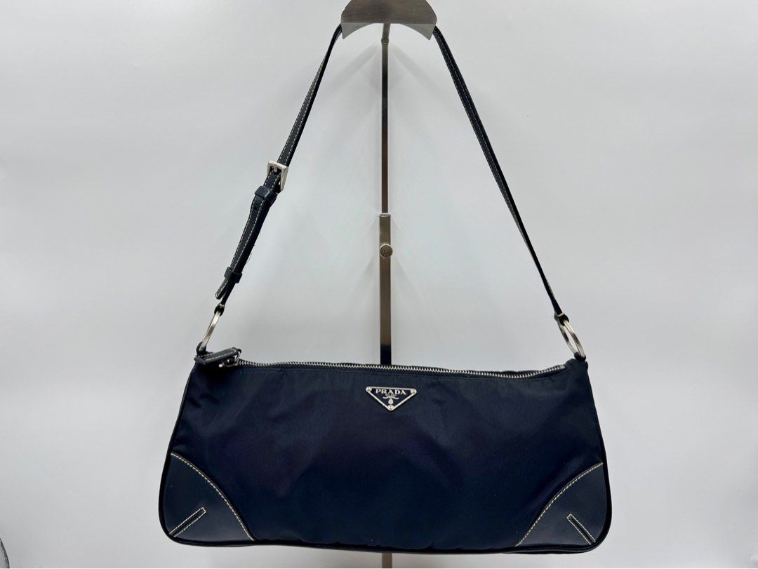 Authentic Prada Pochette (Category: Luxury Bags & Wallets) located in Quezon City. Submitted by fkmanila.lux (Listing ID 1388045830, Image 1). Description: Dimensions: W12.6 x H5.9 x D2.4 in inches ✅ 100% Guaranteed Authentic ✅ Pass to low ballers ✅ Direct buy only ✅ On hand ✅ 1-3 days lead time shipping ✅ No return, no exchange ✅ First-to-pay basis PM for inquiries.