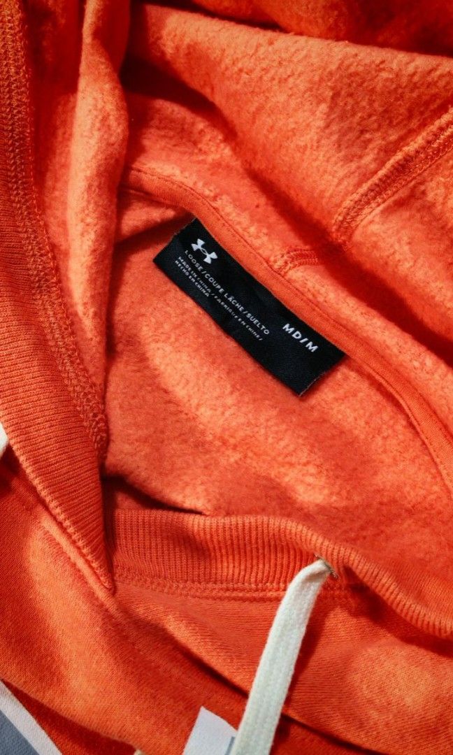 Underarmour Peach Hoodie (Category: Hoodies) located in Cebu City. Submitted by tagph (Listing ID 1387957576, Image 3). Description: Underarmour Size: M Dimes L:26|W:20|SLV:25.5 Condition 8/10 Flaws: None DM for offers.