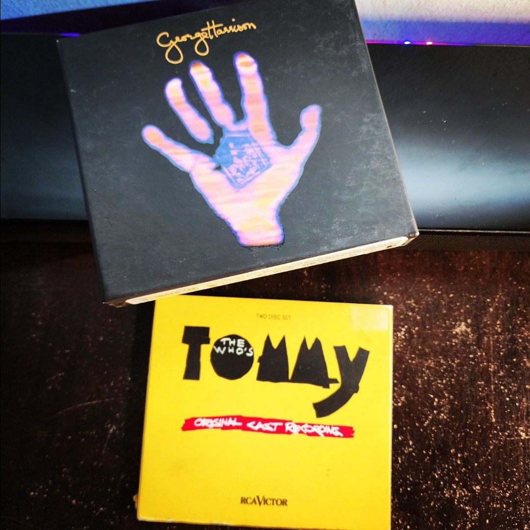 Conceptual & Spiritual Rock Set (Category: CDs & DVDs) located in Paranaque City. Submitted by storagemnl (Listing ID 1388174654, Image 1). Description: Conceptual & Spiritual Rock Set PHP 2820+SF The Who’s Tommy + George Harrison’s George Harrison - Living in the Material World: 50th Anniversary Edition (2CDs) (conceptual grandeur, spiritual songwriting, 70s rock artistry) #StorageMNL *Some cases have wear or damage. Discs may show light marks, 