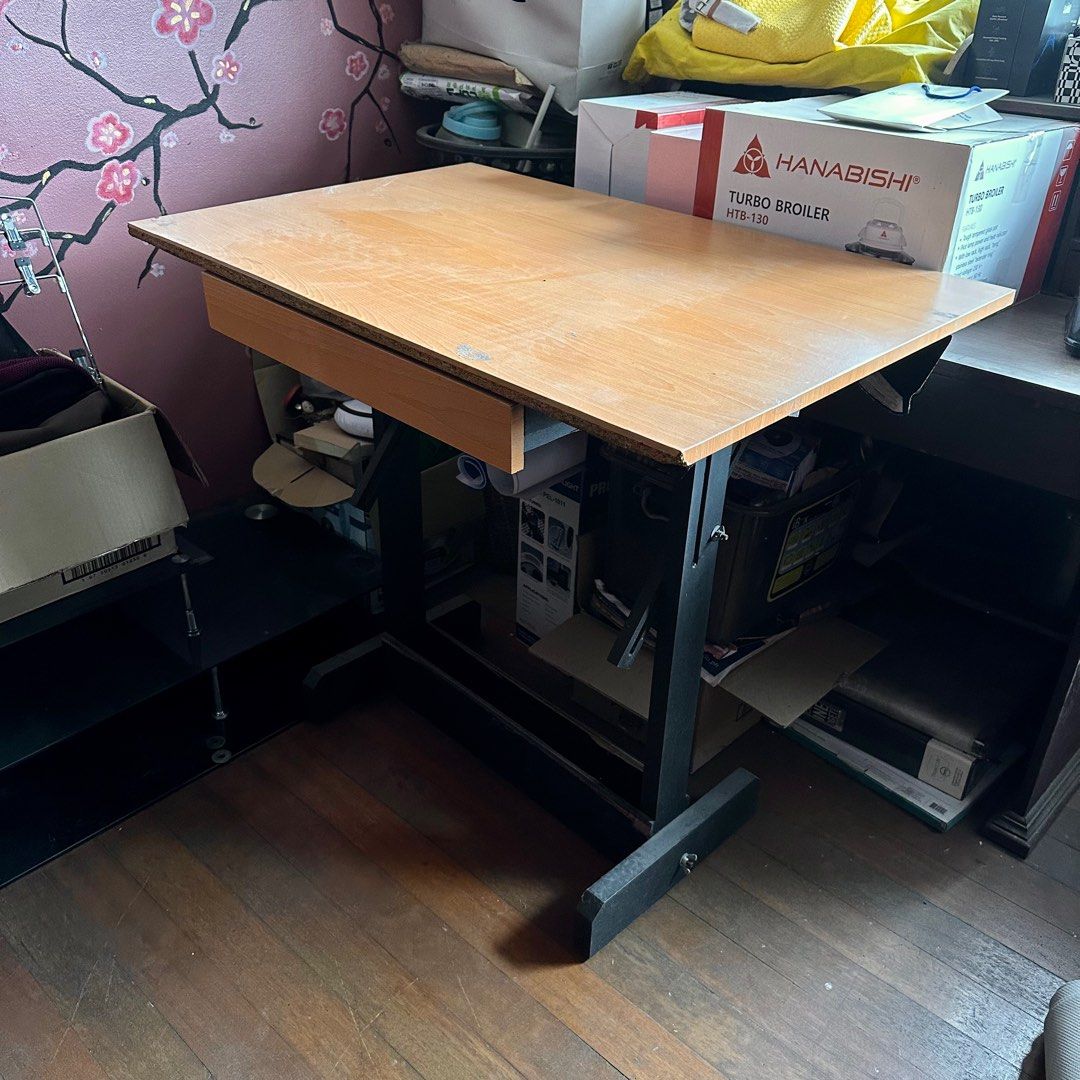 Drafting table : Adjustable Drafting Table (Category: Office Furniture & Fixtures) located in Quezon City. Submitted by leejingco (Listing ID 1388198771, Image 2). Description: Drafting table - adjustable / tilting - for pick up or lalamove / grab (shipping shouldered by buyer) - signs of usage refer to photos for condition Will clean before pick up/shipping 😃.