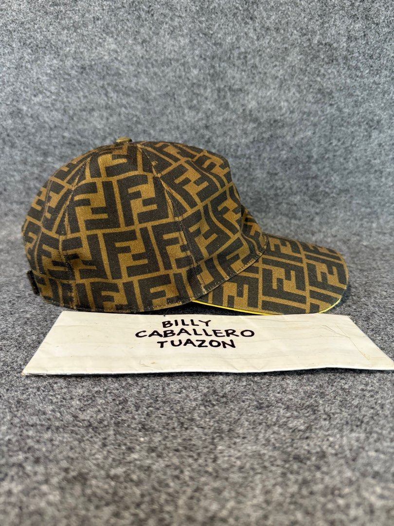 FENDI ZUCCA MONOGRAM DAD HAT / CAP (Category: Luxury Accessories) located in Taguig. Submitted by billsanity (Listing ID 1388209496, Image 2). Description: ⚠️ READ THE DESCRIPTION AND CHECK ALL PICS BEFORE INQUIRING ⚠️ ⚠️GRAB IT BEFORE IT’S GONE⚠️ ⚠️MINE MO NA BAKA MAUNAHAN KA PA MAGSISI KA PA ⚠️ FENDI ZUCCA MONOGRAM DAD HAT / CAP 💯💯💯 Money back guaranteed Rank AB Used but in presentable condition Peeling yung yellow part ng lining nya pero di