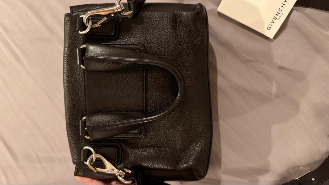 Givenchy Pandora Pure Mini (Category: Luxury Bags & Wallets) located in Quezon City. Submitted by merchperchco (Listing ID 1388228013, Image 2). Description: Givenchy Pandora Pure Mini bag Color black, shw Authentic with care card and dustbag In very good condition Slightly negotiable Rfs: not using it anymore Payment method: BPI or GCash Pick up location: Scout area, QC If lala/grab pick up: Shipping fee c/o buyer If personal pick up, kindly inf
