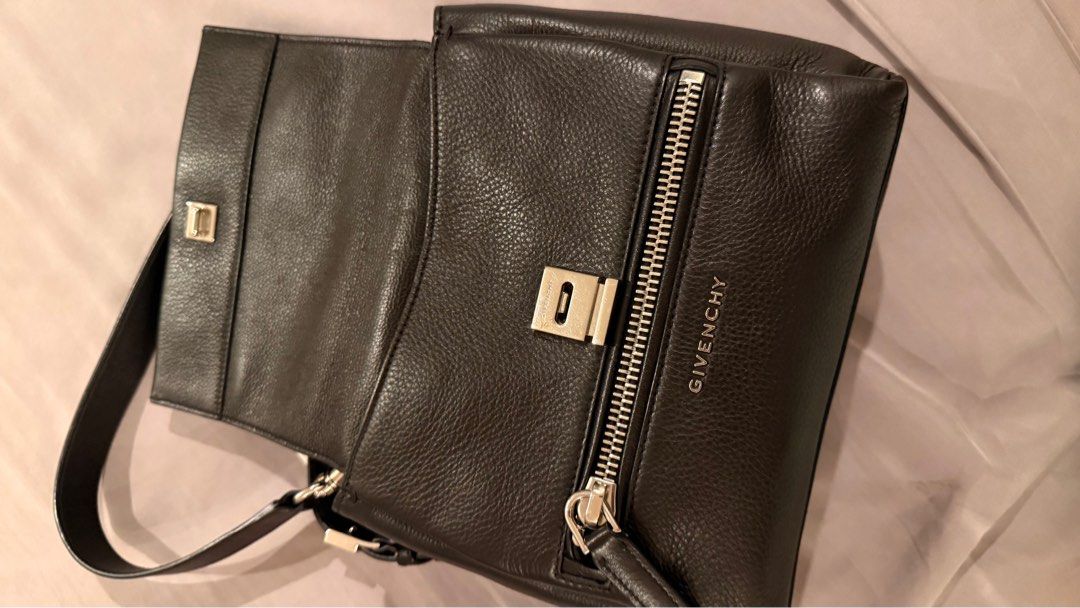 Givenchy Pandora Pure Mini (Category: Luxury Bags & Wallets) located in Quezon City. Submitted by merchperchco (Listing ID 1388228013, Image 3). Description: Givenchy Pandora Pure Mini bag Color black, shw Authentic with care card and dustbag In very good condition Slightly negotiable Rfs: not using it anymore Payment method: BPI or GCash Pick up location: Scout area, QC If lala/grab pick up: Shipping fee c/o buyer If personal pick up, kindly inf