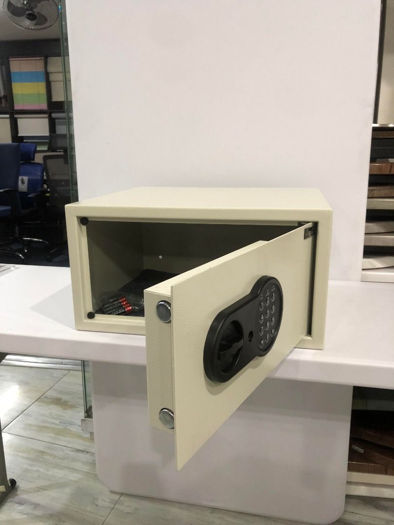iSAFE™ iSFN-40 Electronic Digital Safe (Category: Safe) located in Taguig. Submitted by costuless.taguig (Listing ID 1348045493, Image 3). Description: Item Code: iSFN-40 SALE PRICE: ₱3,499.00 Note: Price may change without prior notice. iSAFE™ Electronic Digital Safe ♡ Colors: Beige & Black ♡ Size: H23 x W44 x D38cm (Laptop size) ♡ Material: Steel ♡ Simple keypad interface ♡ One-touch re-set button inside safe ♡ Time out period: After 3 attempts