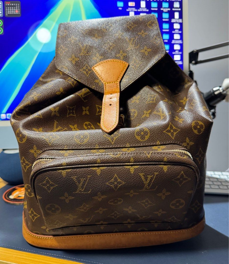 Louis Vuitton Montsouris Backpack GM (Category: Luxury Bags & Wallets) located in Pasig City. Submitted by mr.arc (Listing ID 1388187376, Image 1). Description: Authentic Vintage Louis Vuitton Montsouris Backpack GM Approximately 37 x 31 x 13.5 CM Please check pictures carefully. Bag is well maintained and conditioned. In Vintage condition, water marks, rubs on the leather. Main Issue: I replaced the drawstring and puller cause the original has l