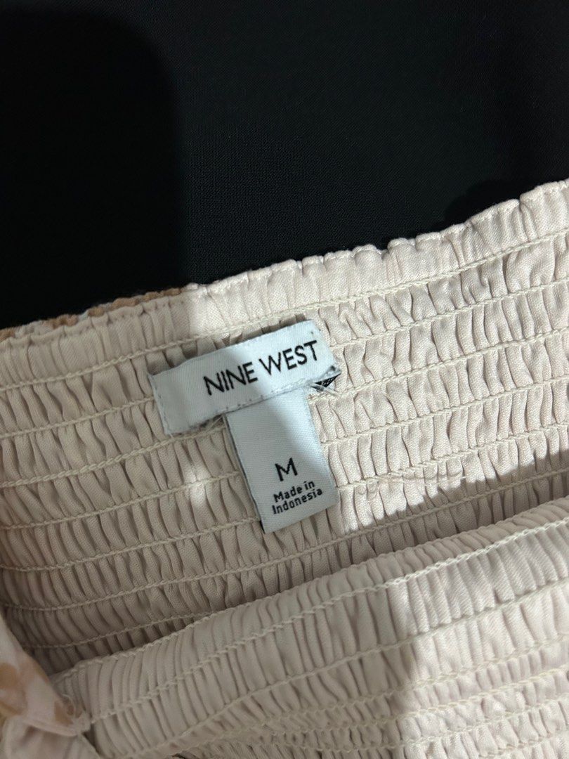 Nine West Smocked Blouse Cheetah Print (Category: Blouses) located in Manila. Submitted by krischannm (Listing ID 1388196113, Image 2). Description: Nine West Smocked Blouse Cheetah Print 💗Medium 💗26 Stretchable to 34 inches 💗Length 17 inches.