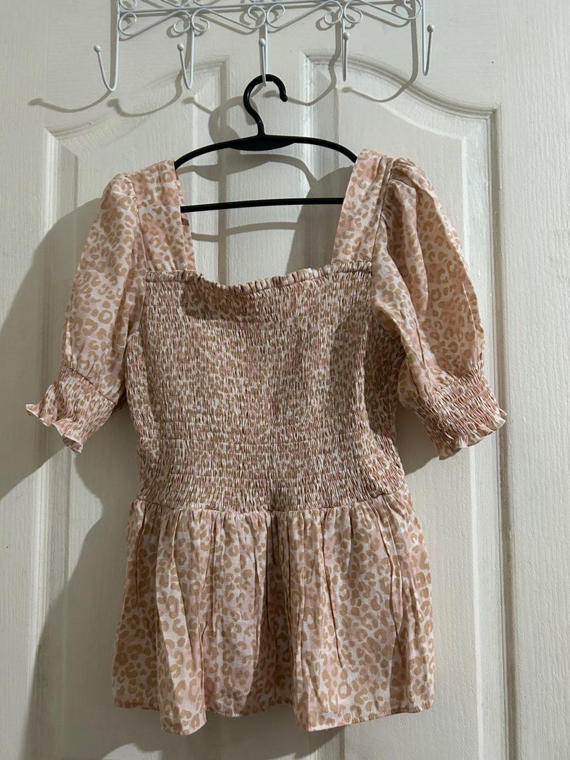 Nine West Smocked Blouse Cheetah Print (Category: Blouses) located in Manila. Submitted by krischannm (Listing ID 1388196113, Image 1). Description: Nine West Smocked Blouse Cheetah Print 💗Medium 💗26 Stretchable to 34 inches 💗Length 17 inches.