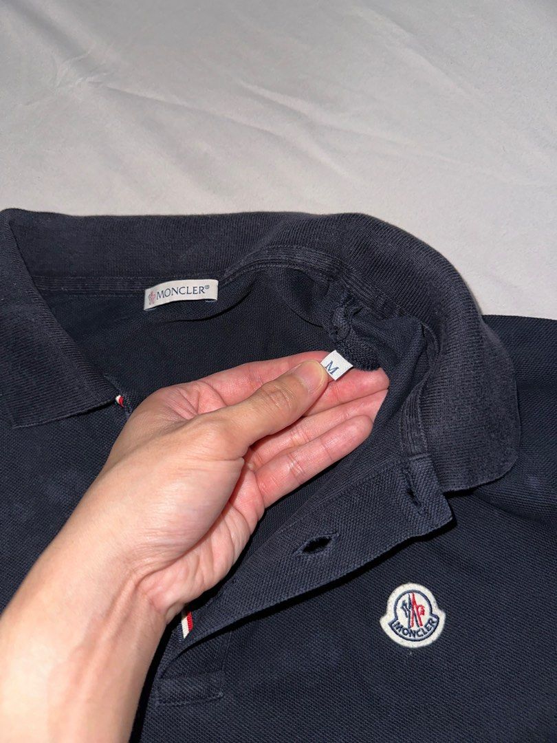 Original Moncler Polo Shirt (Category: Tshirts & Polo Shirts ) located in Pasig City. Submitted by dey2x (Listing ID 1388291155, Image 2). Description: RFS: decluttering -Meetups can be arranged -Delivery via Grab Express/Lalamove/J&T/LBC (c/o buyer) PLEASE TAKE NOTE: This is preowned. Expect signs of usage. NO RETURN POLICY. NO EXCHANGE OF ITEMS..