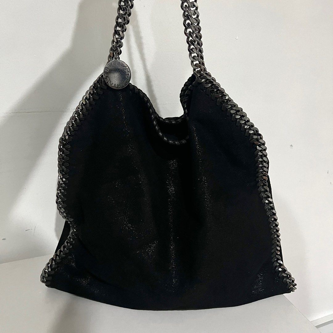 Stella McCartney Fold-Over Bag (Category: Shoulder Bags) located in Mandaluyong City. Submitted by mtotc (Listing ID 1388187890, Image 1). Description: Stella McCartney Fold Over Bag - In mint condition. Barely use this bag. - Black, Faux Suede - Bought from New York, SoHo store - No more dust bag but I can provide.