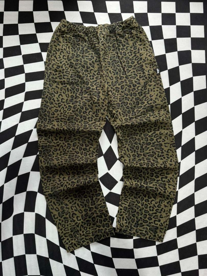Stussy Leopard Beach Pant - Olive (Category: Jeans) located in Cavite. Submitted by wydecollection (Listing ID 1388211546, Image 1). Description: Stussy leopard pants Elasticated Waistband size 28-32 Excellent Condition 2500 asking.