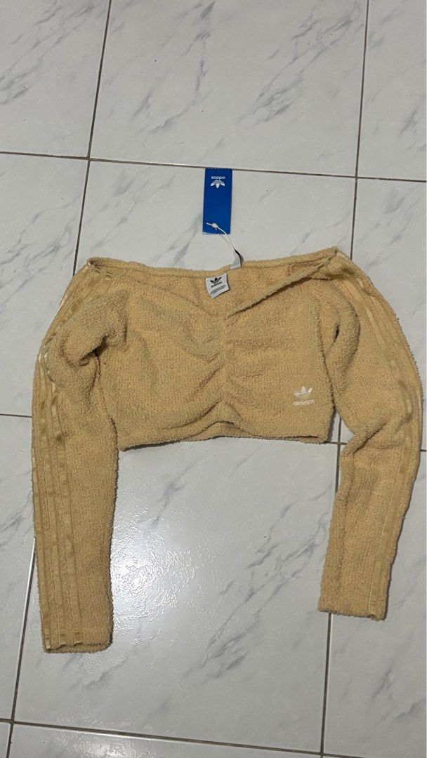 Adidas fluffy cropped top (Category: Others Tops) located in Manila. Submitted by mxryldrn (Listing ID 1388427049, Image 1). Description: Delivery fee c/o buyer. But if total purchased products are above Php1,500 and within metro manila, I will shoulder. Can do meet ups within san juan city. .