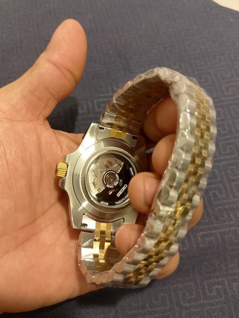 Custom Build Seiko Two tone Full Automatic NH35A Machine (Category: Luxury Watches) located in Taytay. Submitted by danielprad78683 (Listing ID 1388376202, Image 3). Description: For sale Only Brand New Custom Build Seiko Two tone Full Automatic NH35A Machine.Mod. Seiko NH36a Full Automatic Movement with Self winding and Hucking. Pure Stainless Still 904l. Case and Jubilee Bracelet. Sapphire Glass and Cyclops. Other Specifications. Date window Di