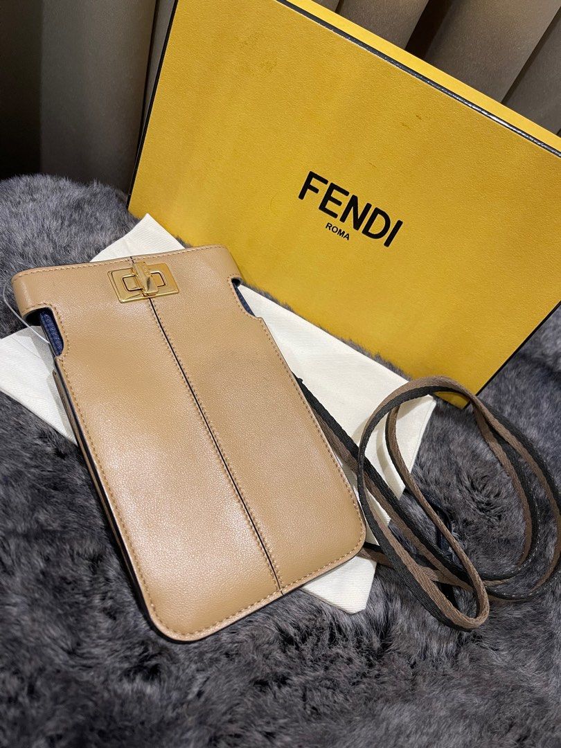 Fendi Mobile Phone Holder Wallet (Category: Luxury Bags & Wallets) located in Quezon City. Submitted by theluxurycityph. (Listing ID 1388343068, Image 2). Description: Fendi Mobile Phone Holder Wallet Box, Dustbag, Booklet We are delighted to let you know that we are now accepting Credit Cards, Debit Cards, and Mobile Payment Apps. Shopping just got easier! 💛 Buy Now Pay Later 3 Months 0% Interest Installment for BDO Cards *additional 5% bank fe