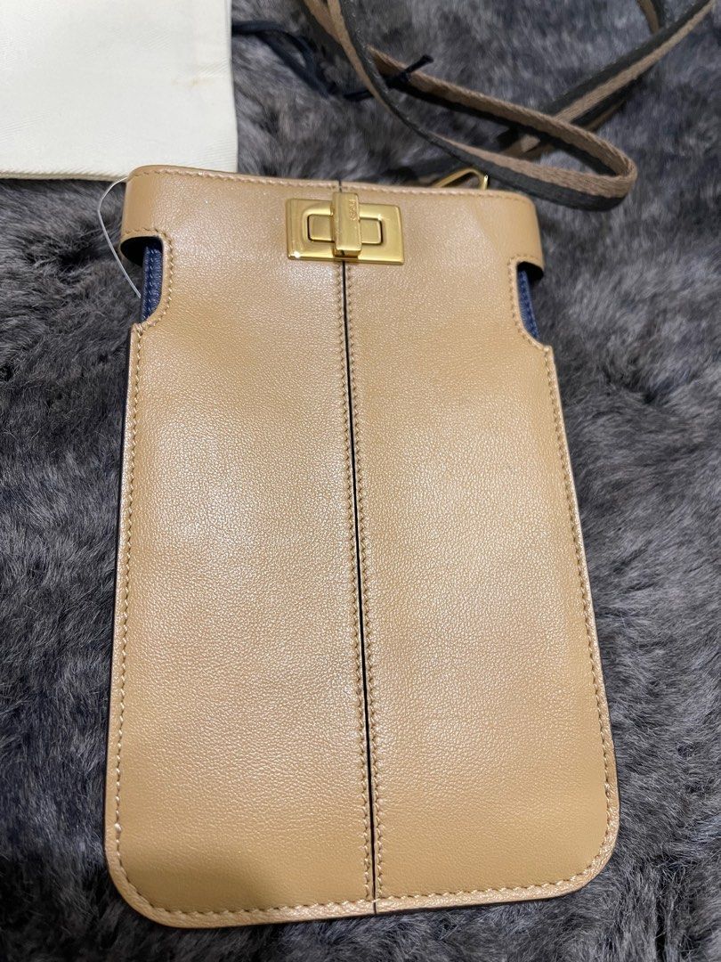 Fendi Mobile Phone Holder Wallet (Category: Luxury Bags & Wallets) located in Quezon City. Submitted by theluxurycityph. (Listing ID 1388343068, Image 3). Description: Fendi Mobile Phone Holder Wallet Box, Dustbag, Booklet We are delighted to let you know that we are now accepting Credit Cards, Debit Cards, and Mobile Payment Apps. Shopping just got easier! 💛 Buy Now Pay Later 3 Months 0% Interest Installment for BDO Cards *additional 5% bank fe