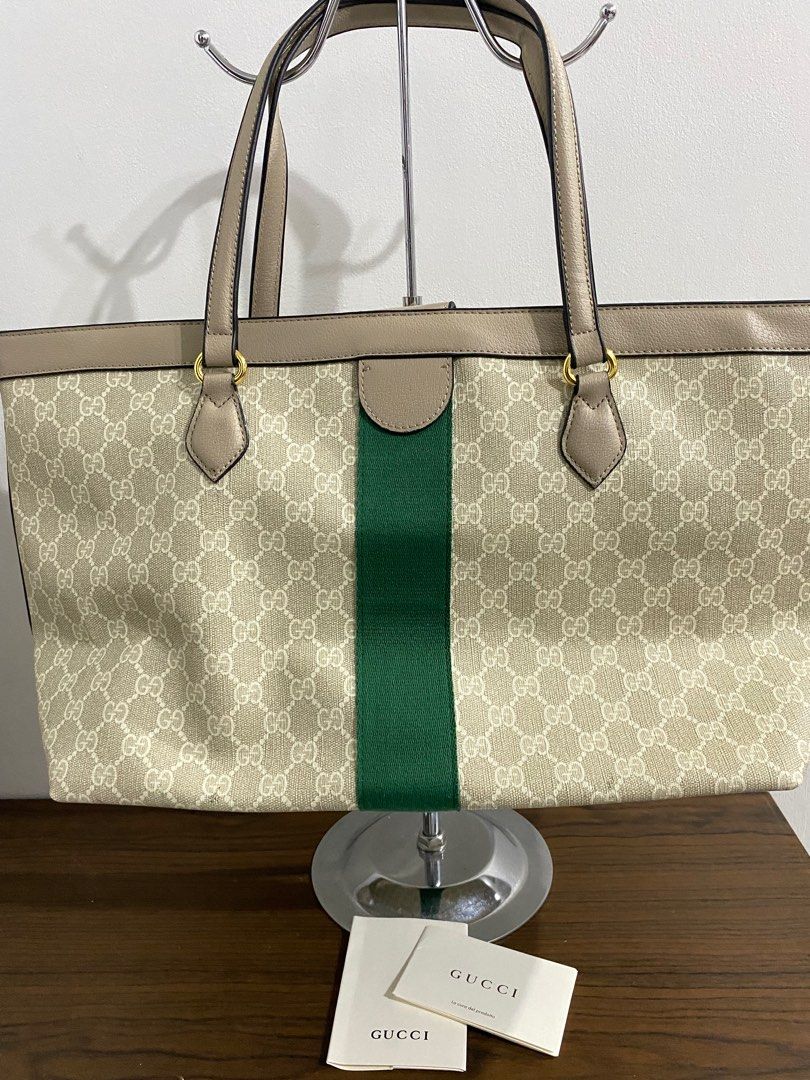 SALE!!!!Gucci Tote Bag (Category: Luxury Bags & Wallets) located in Bulacan. Submitted by knklittlecloset (Listing ID 1388478878, Image 2). Description: SALE!!! Last price posted Gucci Tote Bag In excellent condition, still looks like new. There are a few tiny black marks along the back edge, but they are barely noticeable. Comes with a care card and black tag inside. Not using it anymore. This is a gift so please self-authenticate. Lost the dust