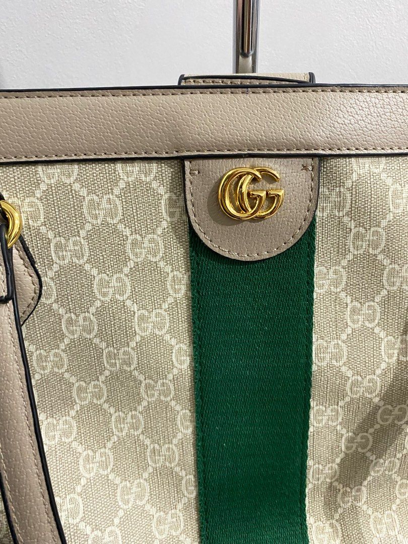 SALE!!!!Gucci Tote Bag (Category: Luxury Bags & Wallets) located in Bulacan. Submitted by knklittlecloset (Listing ID 1388478878, Image 3). Description: SALE!!! Last price posted Gucci Tote Bag In excellent condition, still looks like new. There are a few tiny black marks along the back edge, but they are barely noticeable. Comes with a care card and black tag inside. Not using it anymore. This is a gift so please self-authenticate. Lost the dust