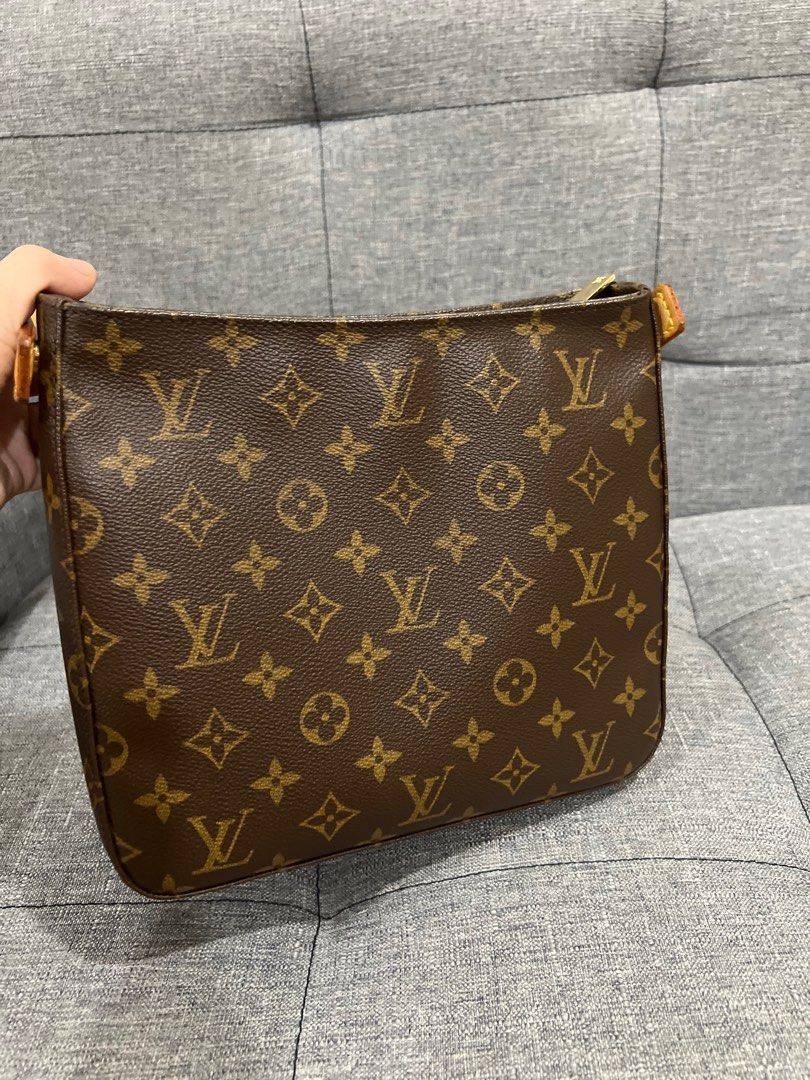 Louis Vuitton Looping MM Monogram bag (Category: Luxury Bags & Wallets) located in Quezon City. Submitted by vickyts43 (Listing ID 1388419182, Image 2). Description: Louis Vuitton Looping MM Monogram bag * Well loved bag. ❗️Only thing to mention❗️ - few discoloration and small cracks/dryness on the vachetta handle (but not noticeable when worn). However, overall it is in good condition. Canvas is still beautiful, insides are clean, and no smell *